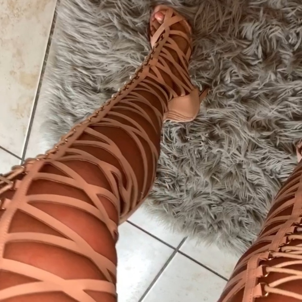 Thigh high gladiator heels